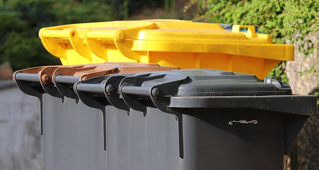 Large trade waste bin full of rubbish